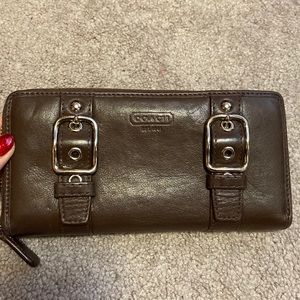 Coach brown leather zip wallet with buckles, gently used